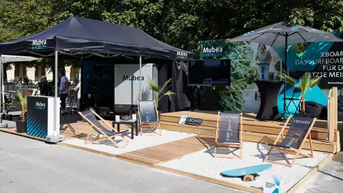 Outdoor Messestand von U-Mobility mit Cargo und Xboard.